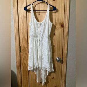 HeartSoul size S ivory-colored fully-lined tank dress with handkerchief hemline